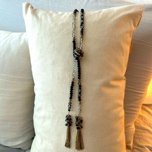 Black, white and gold beaded necklace.